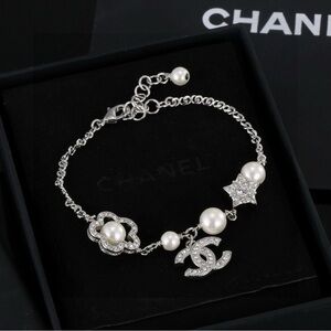 CHANEL Silver Bracelet with Pearls and Star Charm